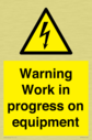 warning-work-in-progress-on-equipmentwith-electrical-hazard-symbol~